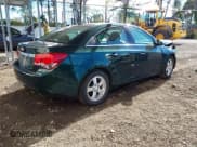 ✅ 2014 Chevrolet Cruze 1LT • VIN: 1G1PC5SB3E7185136 • Lot: 43482848. Listed on IAAI with 34,370 mi. Free auction sales archive from the USA and detailed vehicle history report at DreamBid. Image 4.