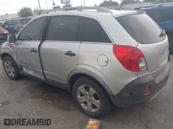 ✅ 2015 Chevrolet Captiva Sport LS • VIN: 3GNAL2EK8FS519825 • Лот: 43102487. Опубликован ранее на IAAI с пробегом 156 499 миль. Бесплатный доступ к архиву аукционных продаж из США и подробный отчёт об истории автомобиля на DreamBid. Изображение 3.