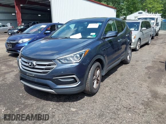 ✅ 2017 Hyundai Santa Fe 2.4L • VIN: 5XYZTDLB9HG441313 • Lot: 42742060. Listed on IAAI with 68,089 mi. Free auction sales archive from the USA and detailed vehicle history report at DreamBid. Image 2.
