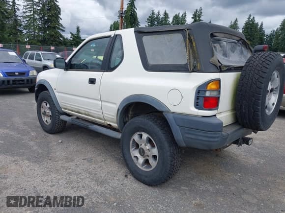 ✅ 1998 Isuzu Amigo • VIN: 4S2CM57W9W4373049 • Лот: 42599157. Опубликован ранее на IAAI с пробегом 140 368 миль. Бесплатный доступ к архиву аукционных продаж из США и подробный отчёт об истории автомобиля на DreamBid. Изображение 3.