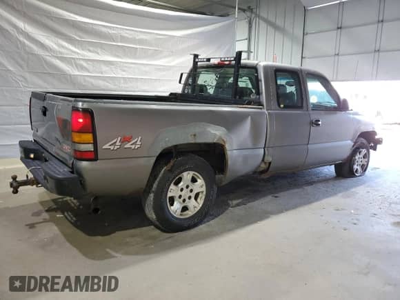 2006 GMC Sierra 1500 Work Truck with VIN 2GTEK19V561322294, listed as a Copart auction lot 52258795 with 169,601 mi miles and Clean title. Bid and sale history available at DreamBid. Image 3.