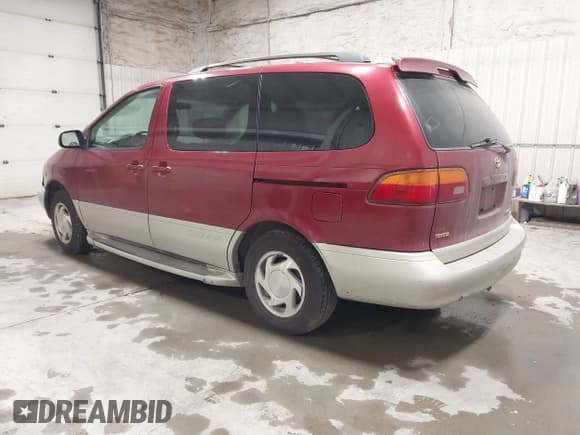 ✅ 1998 Toyota Sienna LE • VIN: 4T3ZF13C4WU062104 • Lot: 43020678. Listed on IAAI with 182,338 mi. Free auction sales archive from the USA and detailed vehicle history report at DreamBid. Image 3.