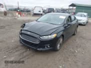 ✅ 2016 Ford Fusion Titanium • VIN: 3FA6P0K91GR261347 • Lot: 43737815. Listed on IAAI with 205,791 mi. Free auction sales archive from the USA and detailed vehicle history report at DreamBid. Image 17.