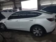 ✅ 2023 Tesla Model Y Long Range • VIN: 7SAYGDEE7PF596216 • Lot: 41557542. Listed on IAAI with 95,065 mi. Free auction sales archive from the USA and detailed vehicle history report at DreamBid. Image 13.