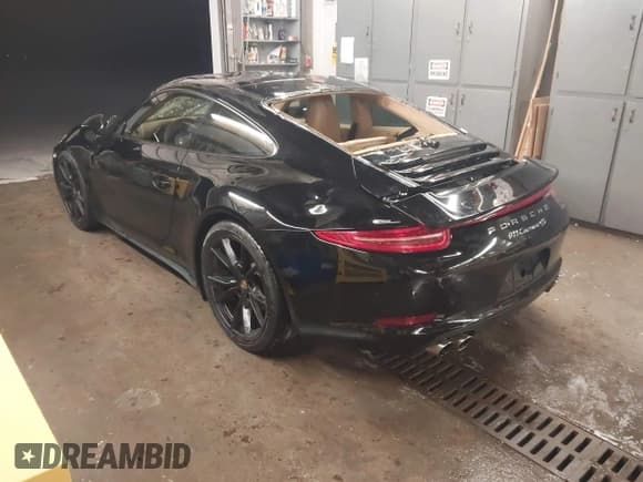 ✅ 2015 Porsche 911 Carrera S • VIN: WP0AB2A96FS125928 • Lot: 43813644. Listed on IAAI with 13,850 mi. Free auction sales archive from the USA and detailed vehicle history report at DreamBid. Image 3.