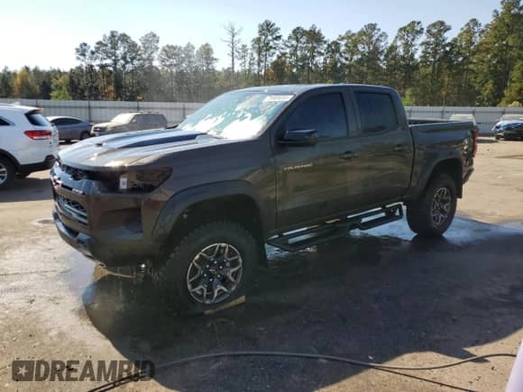 2023 Chevrolet Colorado 4WD ZR2 с VIN 1GCPTFEK1P1266599, выставлен на аукционе Copart как лот 75989054 с пробегом Не указан миль и Списание • Salvage title. История ставок и продаж доступна на DreamBid. Изображение 1.