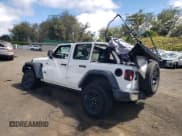 ✅ 2023 Jeep Wrangler Sport • VIN: 1C4HJXDG6PW701228 • Lot: 89730765. Listed on Copart with 54,804 mi. Free auction sales archive from the USA and detailed vehicle history report at DreamBid. Image 2.