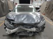 ✅ 2020 Honda Civic LX • VIN: 19XFC2F67LE006057 • Lot: 42032759. Listed on IAAI with 119,319 mi. Free auction sales archive from the USA and detailed vehicle history report at DreamBid. Image 13.