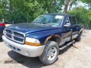 ✅ 2004 Dodge Dakota SLT • VIN: 1D7HG48N94S643579 • Lot: 42457885. Listed on IAAI with 165,445 mi. Free auction sales archive from the USA and detailed vehicle history report at DreamBid. Image 2.