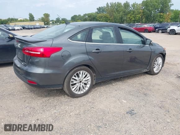 ✅ 2017 Ford Focus Titanium • VIN: 1FADP3J20HL238784 • Лот: 43216971. Опубликован ранее на IAAI с пробегом 60 239 миль. Бесплатный доступ к архиву аукционных продаж из США и подробный отчёт об истории автомобиля на DreamBid. Изображение 4.
