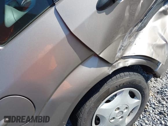 ✅ 2003 Ford Focus LX • VIN: 1FAFP33P63W324786 • Lot: 42693187. Wystawiony na IAAI z przebiegiem 128 597 mil. Bezpłatny archiwum sprzedaży aukcyjnych z USA i szczegółowy raport historii pojazdu na DreamBid. Zdjęcie 20.