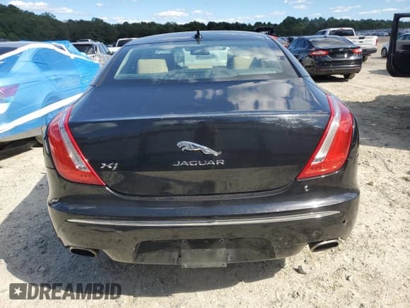 ✅ 2015 Jaguar XJ • VIN: SAJWJ1CD8F8V80055 • Lot: 69726395. Listed on Copart with 66,455 mi. Free auction sales archive from the USA and detailed vehicle history report at DreamBid. Image 6.