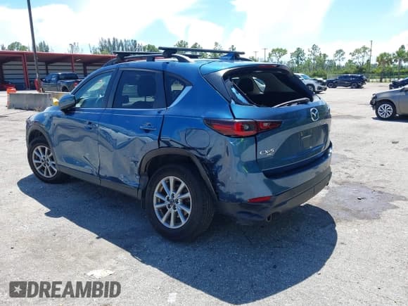 ✅ 2022 Mazda CX-5 S Carbon Edition • VIN: JM3KFBCM5N0620116 • Lot: 43033082. Listed on IAAI with 48,059 mi. Free auction sales archive from the USA and detailed vehicle history report at DreamBid. Image 6.