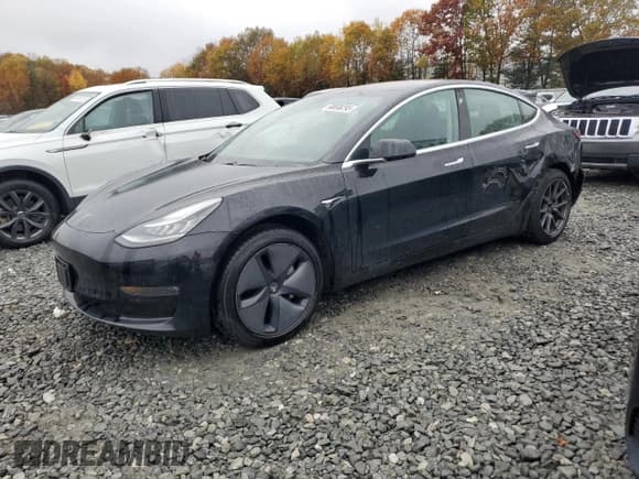 ✅ 2019 Tesla Model 3 Mid Range • VIN: 5YJ3E1EA6KF189974 • Лот: 90698295. Опубликован ранее на Copart с пробегом 50 723 миль. Бесплатный доступ к архиву аукционных продаж из США и подробный отчёт об истории автомобиля на DreamBid. Изображение 1.