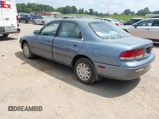 ✅ 1997 Mazda 626 DX • VIN: 1YVGE22CXV5664944 • Lot: 43037583. Listed on IAAI with 273,792 mi. Free auction sales archive from the USA and detailed vehicle history report at DreamBid. Image 3.