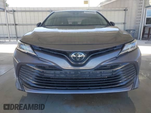 2020 Toyota Camry LE with VIN 4T1C11AK8LU320868, listed as a Copart auction lot 67942255 with 119,976 mi miles and Salvage title. Bid and sale history available at DreamBid. Image 5.
