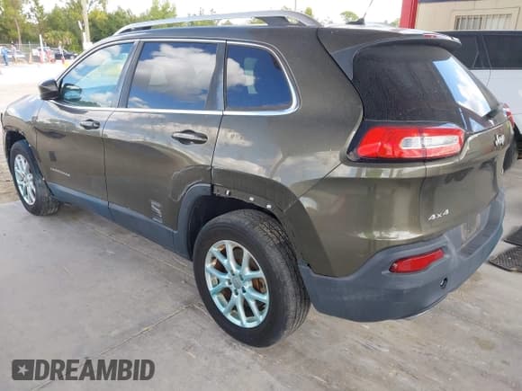 ✅ 2015 Jeep Cherokee Latitude • VIN: 1C4PJMCS8FW559172 • Lot: 43681804. Listed on IAAI with 35,998 mi. Free auction sales archive from the USA and detailed vehicle history report at DreamBid. Image 3.