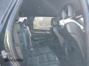 ✅ 2014 Jeep Grand Cherokee Limited • VIN: 1C4RJEBG9EC373961 • Lot: 43491205. Listed on IAAI with 150,485 mi. Free auction sales archive from the USA and detailed vehicle history report at DreamBid. Image 8.