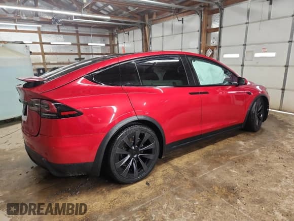 ✅ 2022 Tesla Model X • VIN: 7SAXCDE59NF340602 • Lot: 83825515. Wystawiony na Copart z przebiegiem 54 053 mil. Bezpłatny archiwum sprzedaży aukcyjnych z USA i szczegółowy raport historii pojazdu na DreamBid. Zdjęcie 3.