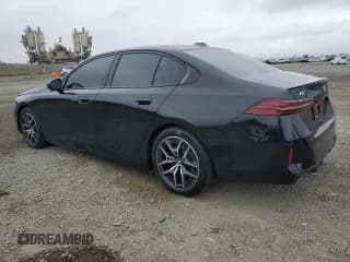 ✅ 2025 BMW i5 eDrive40 • VIN: WBY33FK07SCT28536 • Лот: 60140185. Опубликован ранее на Copart с пробегом 9 704 миль. Бесплатный доступ к архиву аукционных продаж из США и подробный отчёт об истории автомобиля на DreamBid. Изображение 2.