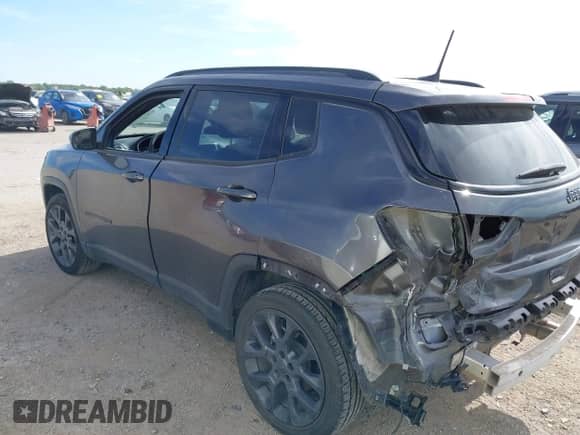 2021 Jeep Compass 80th Anniversary z VIN 3C4NJCEB0MT604218, wystawiony jako IAAI lot #42316107 z przebiegiem 73 743 mil mil oraz . Historia ofert i sprzedaży dostępna na DreamBid. Obrazek 3.