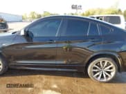 ✅ 2016 BMW X4 M40i • VIN: 5UXXW7C59G0M91223 • Lot: 42009394. Listed on IAAI with 144,771 mi. Free auction sales archive from the USA and detailed vehicle history report at DreamBid. Image 14.