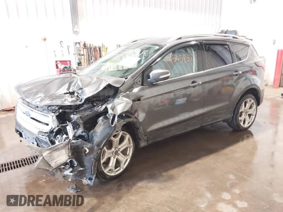 ✅ 2019 Ford Escape Titanium • VIN: 1FMCU9J90KUB27793 • Lot: 43458371. Listed on IAAI with 83,245 mi. Free auction sales archive from the USA and detailed vehicle history report at DreamBid. Image 2.