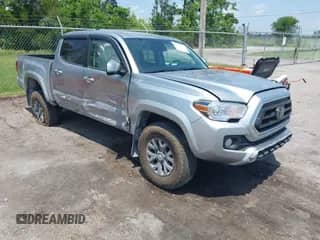 2022 Toyota Tacoma SR5 with VIN 3TMAZ5CN5NM181423, listed as a IAAI auction lot 42313764 with 64,266 mi miles and . Bid and sale history available at DreamBid. Image 1.