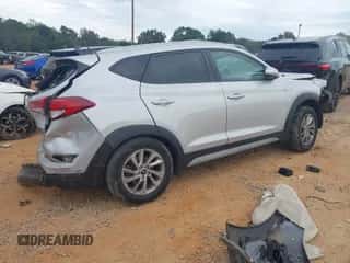2017 Hyundai Tucson SE z VIN KM8J33A44HU400464, wystawiony jako IAAI lot #43404828 z przebiegiem 155 489 mil mil oraz . Historia ofert i sprzedaży dostępna na DreamBid. Obrazek 4.