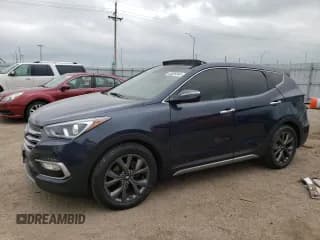 ✅ 2017 Hyundai Santa Fe Ultimate • VIN: 5XYZWDLA1HG473090 • Лот: 65589344. Опубликован ранее на Copart с пробегом 88 367 миль. Бесплатный доступ к архиву аукционных продаж из США и подробный отчёт об истории автомобиля на DreamBid. Изображение 1.