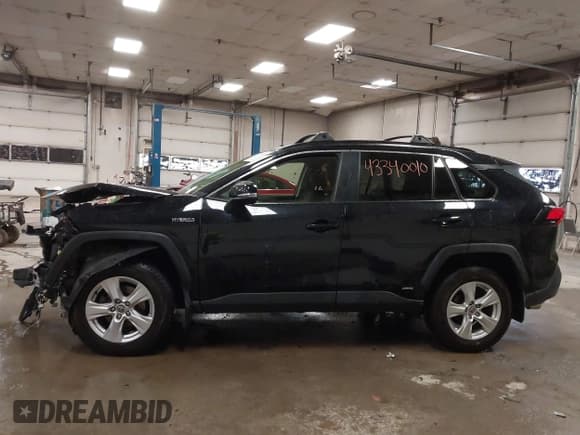 ✅ 2021 Toyota RAV4 Hybrid LE • VIN: JTMMWRFVXMD126744 • Lot: 43340010. Listed on IAAI with 33,821 mi. Free auction sales archive from the USA and detailed vehicle history report at DreamBid. Image 14.