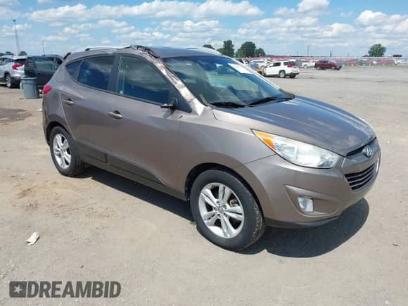 2013 Hyundai Tucson GLS z VIN KM8JU3AC5DU624633, wystawiony jako IAAI lot #42366217 z przebiegiem 108 258 mil mil oraz . Historia ofert i sprzedaży dostępna na DreamBid. Obrazek 1.