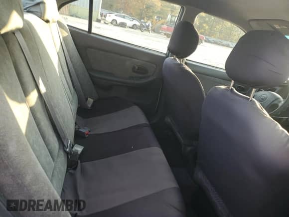 2003 Hyundai Elantra GLS z VIN KMHDN45D03U678570, wystawiony jako Copart lot #81039634 z przebiegiem 335 547 mil mil oraz Szkoda całkowita • Salvage title. Historia ofert i sprzedaży dostępna na DreamBid. Obrazek 10.