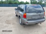 ✅ 2006 GMC Envoy SLE • VIN: 1GKDT13S462146169 • Lot: 42686071. Listed on IAAI with 255,000 mi. Free auction sales archive from the USA and detailed vehicle history report at DreamBid. Image 3.