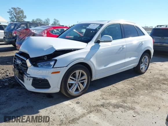 ✅ 2016 Audi Q3 Premium Plus • VIN: WA1EFCFS2GR017798 • Lot: 43794524. Listed on IAAI with 55,666 mi. Free auction sales archive from the USA and detailed vehicle history report at DreamBid. Image 17.