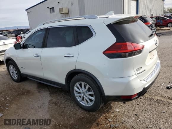 ✅ 2017 Nissan Rogue SV Hybrid • VIN: 5N1ET2MT4HC800027 • Lot: 79969664. Listed on Copart with 128,575 mi. Free auction sales archive from the USA and detailed vehicle history report at DreamBid. Image 2.