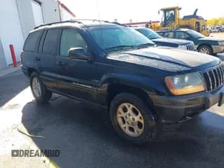 ✅ 2001 Jeep Grand Cherokee Laredo • VIN: 1J4GW48S31C689780 • Lot: 43567259. Listed on IAAI with 156,399 mi. Free auction sales archive from the USA and detailed vehicle history report at DreamBid. Image 1.