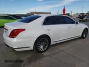 ✅ 2019 Genesis G90 Premium • VIN: KMHG34JA1KU050157 • Лот: 87208564. Опубликован ранее на Copart с пробегом 75 972 миль. Бесплатный доступ к архиву аукционных продаж из США и подробный отчёт об истории автомобиля на DreamBid. Изображение 3.