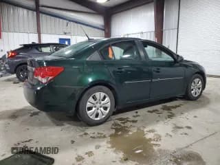 ✅ 2014 Chevrolet Cruze LS • VIN: 1G1PA5SH1E7209346 • Lot: 90811405. Listed on Copart with 90,309 mi. Free auction sales archive from the USA and detailed vehicle history report at DreamBid. Image 3.