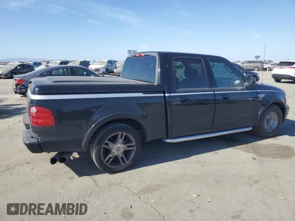 ✅ 2003 Ford F-150 Harley-Davidson • VIN: 1FTRW07373KC44985 • Lot: 58571585. Listed on Copart with 202,249 mi. Free auction sales archive from the USA and detailed vehicle history report at DreamBid. Image 3.
