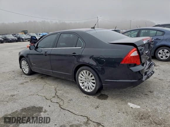 ✅ 2010 Ford Fusion Hybrid • VIN: 3FADP0L38AR324372 • Lot: 94102905. Listed on Copart with 124,591 mi. Free auction sales archive from the USA and detailed vehicle history report at DreamBid. Image 2.
