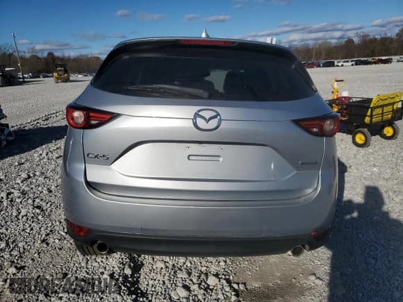 ✅ 2021 Mazda CX-5 Grand Touring • VIN: JM3KFADM4M0391130 • Lot: 93041755. Wystawiony na Copart z przebiegiem 91 710 mil. Bezpłatny archiwum sprzedaży aukcyjnych z USA i szczegółowy raport historii pojazdu na DreamBid. Zdjęcie 6.