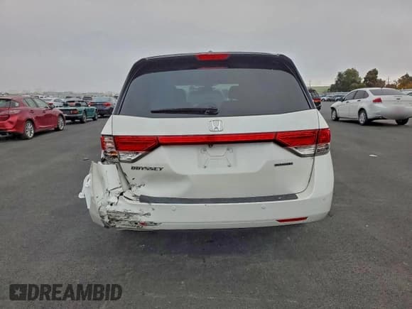 ✅ 2015 Honda Odyssey Touring Elite • VIN: 5FNRL5H94FB104726 • Lot: 96195135. Listed on Copart with 51,594 mi. Free auction sales archive from the USA and detailed vehicle history report at DreamBid. Image 6.