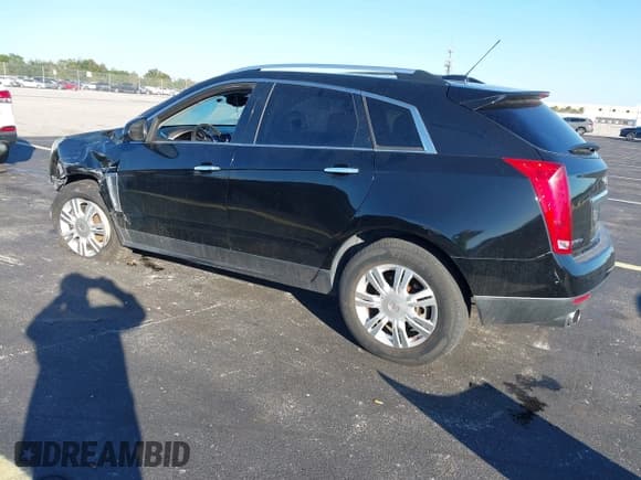 ✅ 2015 Cadillac SRX Luxury Collection • VIN: 3GYFNEE38FS595607 • Lot: 43720579. Listed on IAAI with 103,582 mi. Free auction sales archive from the USA and detailed vehicle history report at DreamBid. Image 3.