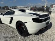 ✅ 2014 McLaren MP4-12C • VIN: SBM11BAA4EW003094 • Lot: 60408625. Wystawiony na Copart z przebiegiem 23 451 mil. Bezpłatny archiwum sprzedaży aukcyjnych z USA i szczegółowy raport historii pojazdu na DreamBid. Zdjęcie 3.