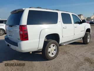 2012 Chevrolet Suburban LT z VIN 1GNSKJE74CR256132, wystawiony jako IAAI lot #43120737 z przebiegiem 195 627 mil mil oraz . Historia ofert i sprzedaży dostępna na DreamBid. Obrazek 4.