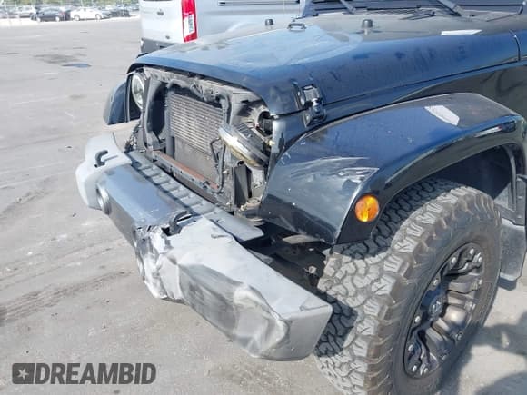 ✅ 2015 Jeep Wrangler Sport • VIN: 1C4AJWAG1FL594007 • Lot: 43779956. Listed on IAAI with 170,911 mi. Free auction sales archive from the USA and detailed vehicle history report at DreamBid. Image 18.