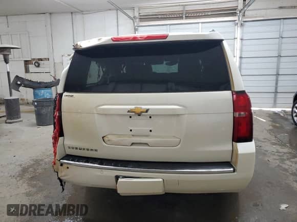 2015 Chevrolet Suburban LTZ z VIN 1GNSKKKC1FR734292, wystawiony jako Copart lot #69274444 z przebiegiem 78 973 mil mil oraz Szkoda całkowita • Salvage title. Historia ofert i sprzedaży dostępna na DreamBid. Obrazek 6.