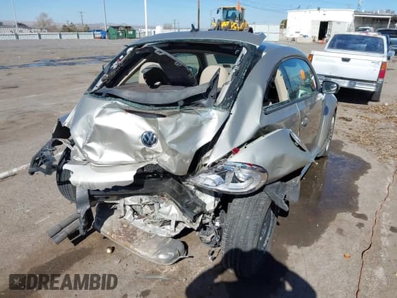 ✅ 2013 Volkswagen Beetle 2.5L • VIN: 3VWHX7AT0DM663696 • Lot: 41485832. Listed on IAAI with 111,465 mi. Free auction sales archive from the USA and detailed vehicle history report at DreamBid. Image 6.