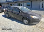 ✅ 2017 Ford Focus S • VIN: 1FADP3E23HL221097 • Лот: 82450025. Опубликован ранее на Copart с пробегом 98 700 миль. Бесплатный доступ к архиву аукционных продаж из США и подробный отчёт об истории автомобиля на DreamBid. Изображение 4.